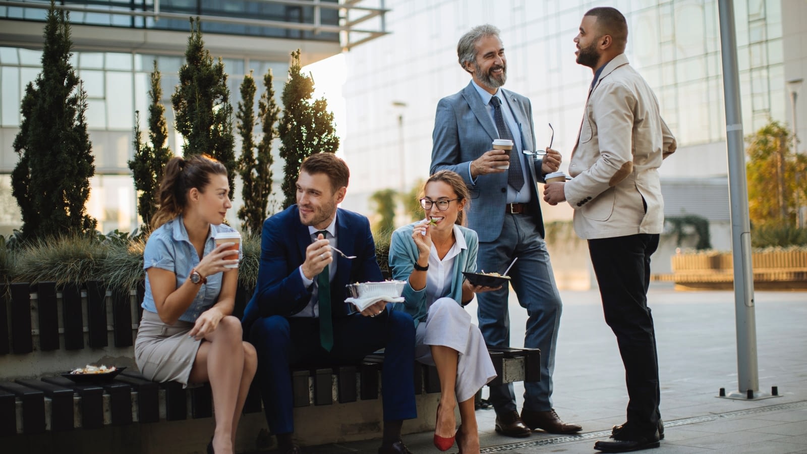 employees eating lunch outside