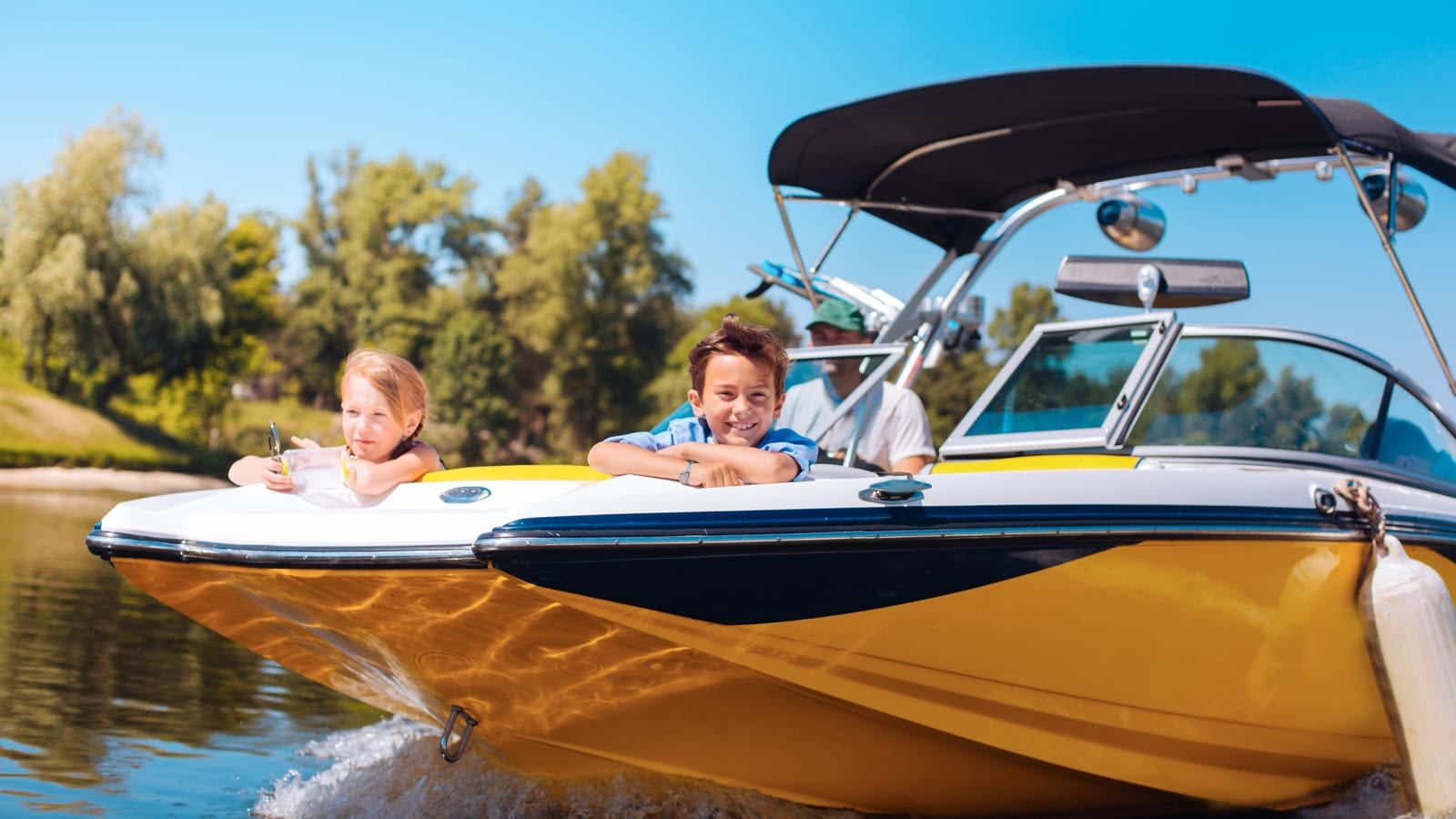 Kids riding in a boat