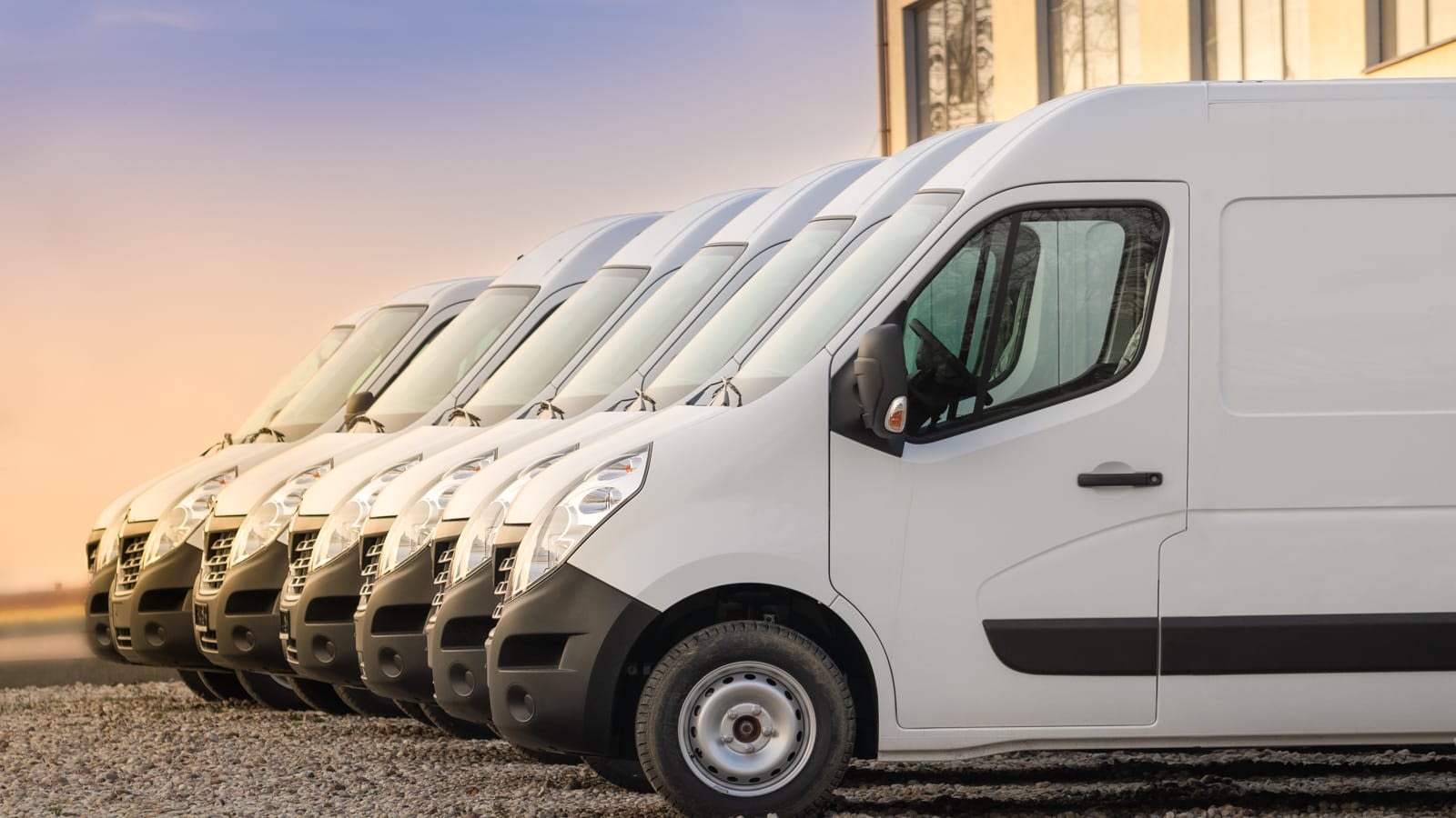 Fleet of white commercial vans