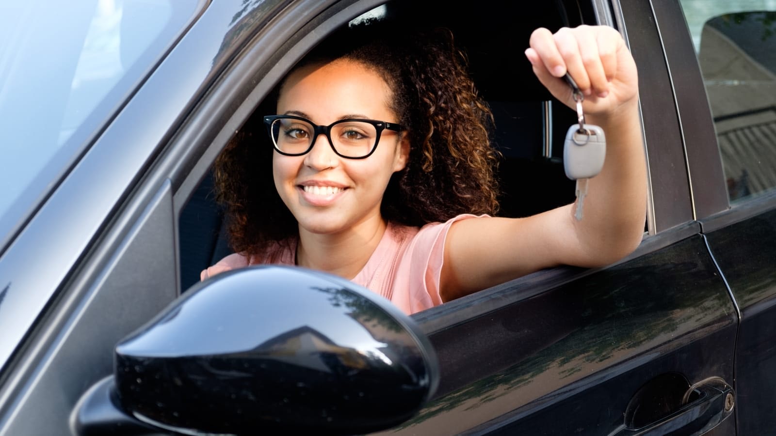 Teenage driver in a car