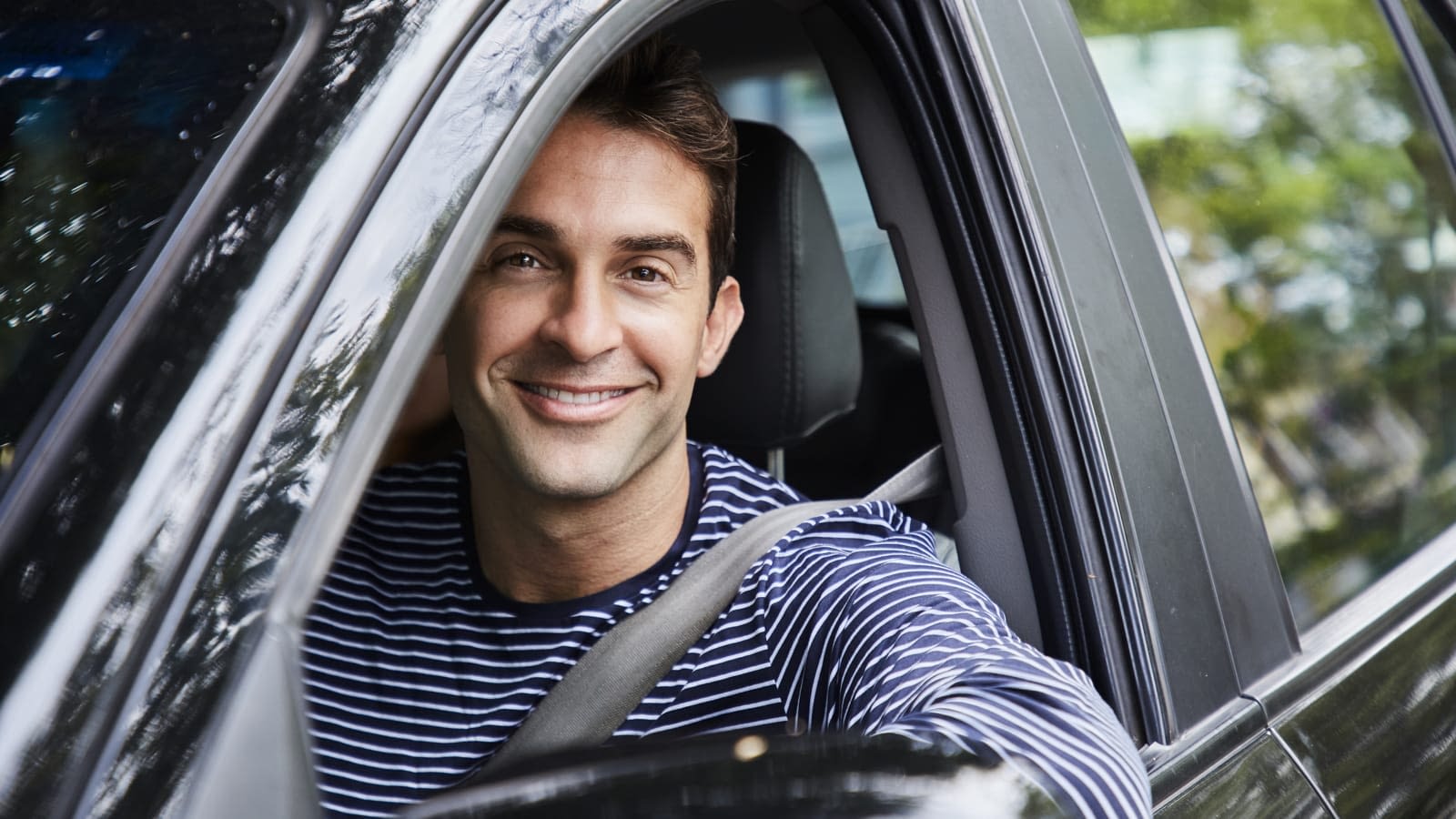 Young Male Driver Young male driver smiling