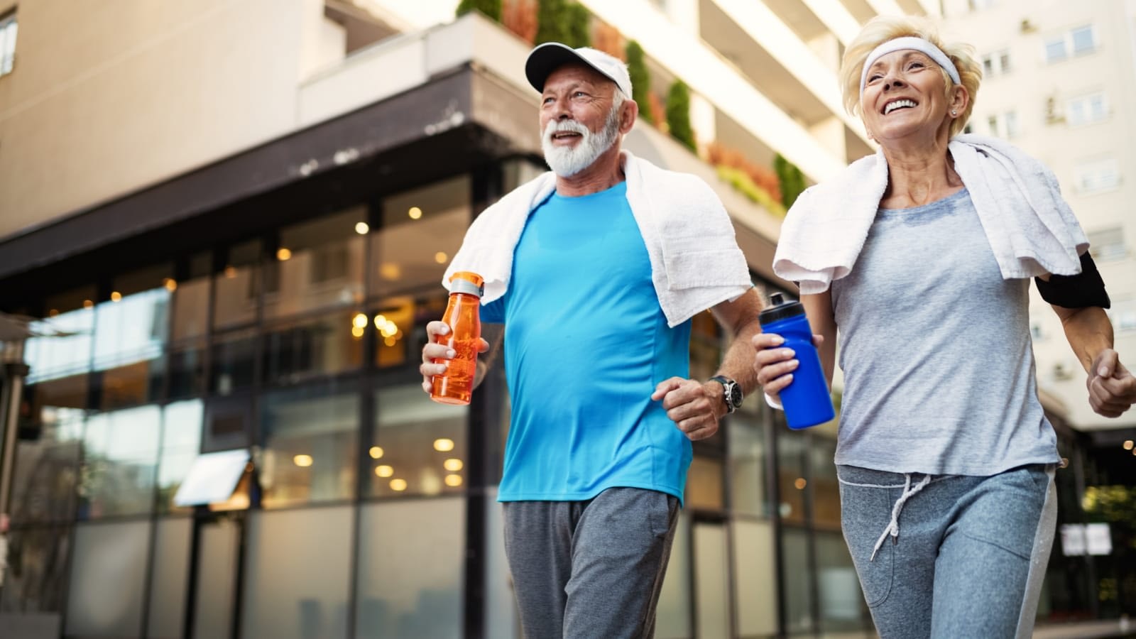 Two mature people walking