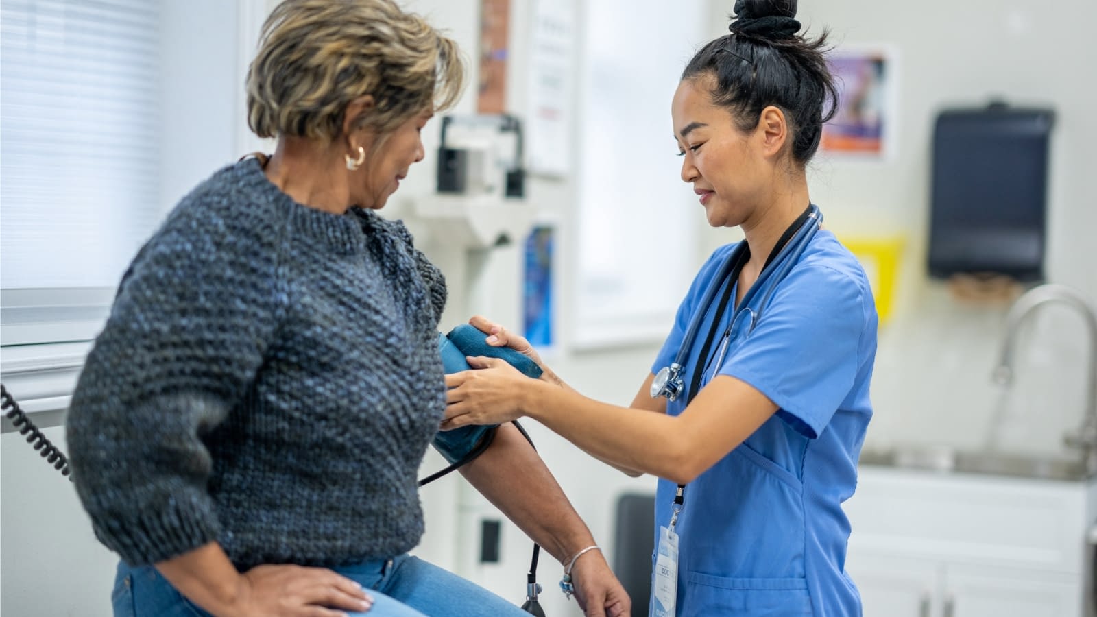 Feb 6 blog Older woman getting blood pressure taken by doctor