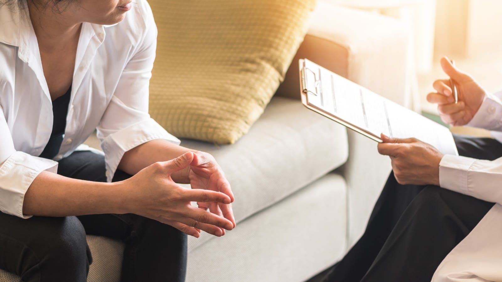 woman speaking with doctor