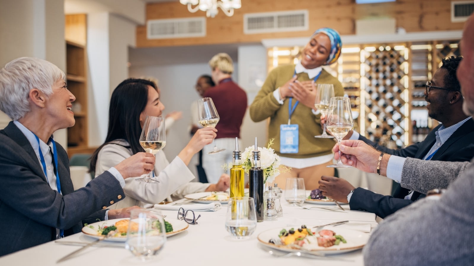 group of employees making a toast at office party.