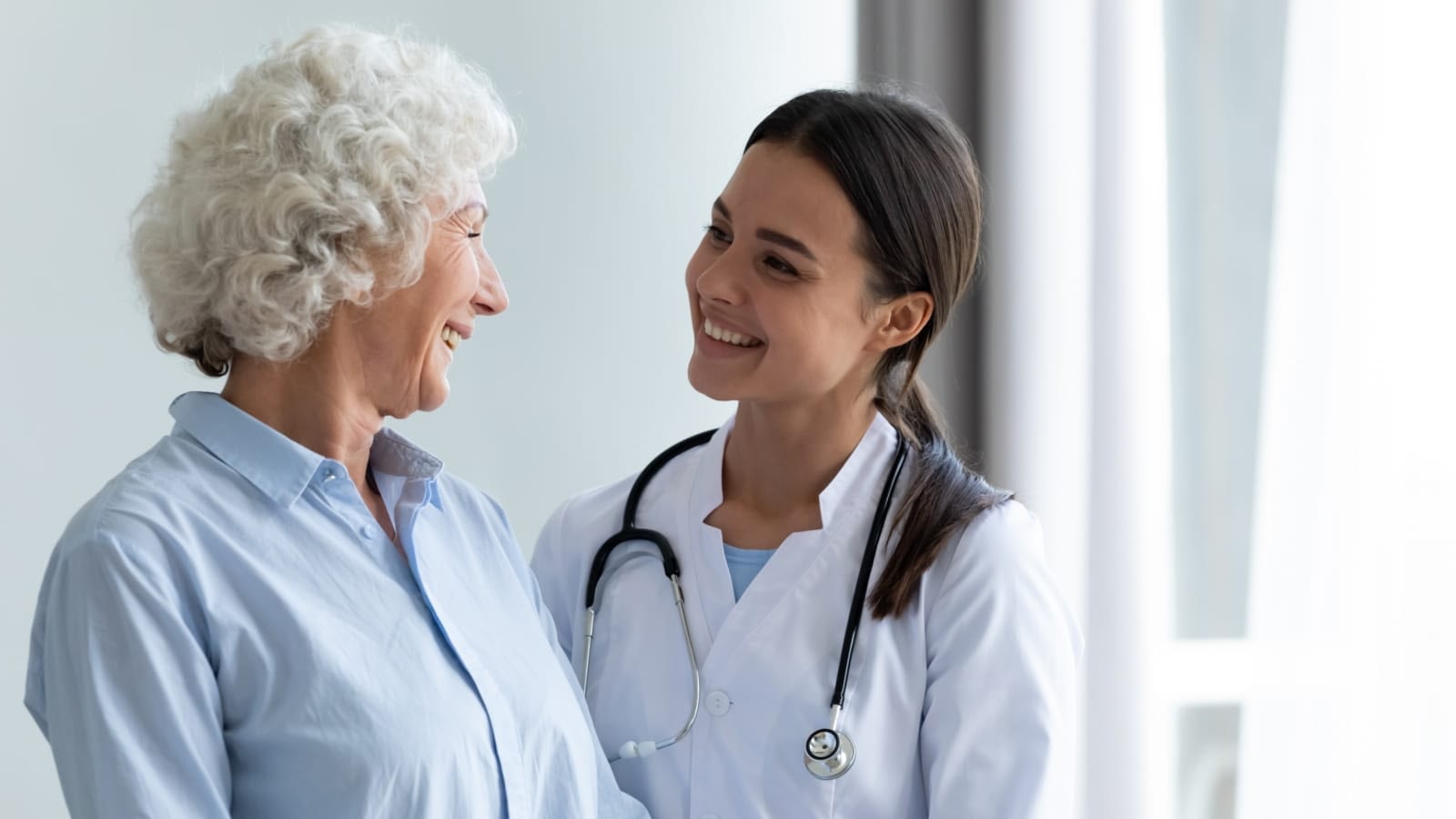 Senior Woman speaking with primary doctor