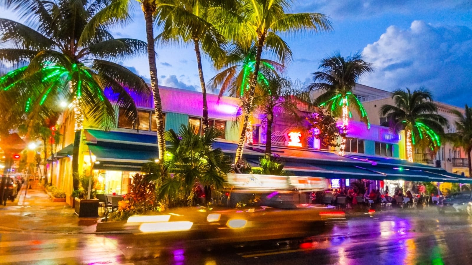 hospitality businesses lit up at night in Miami