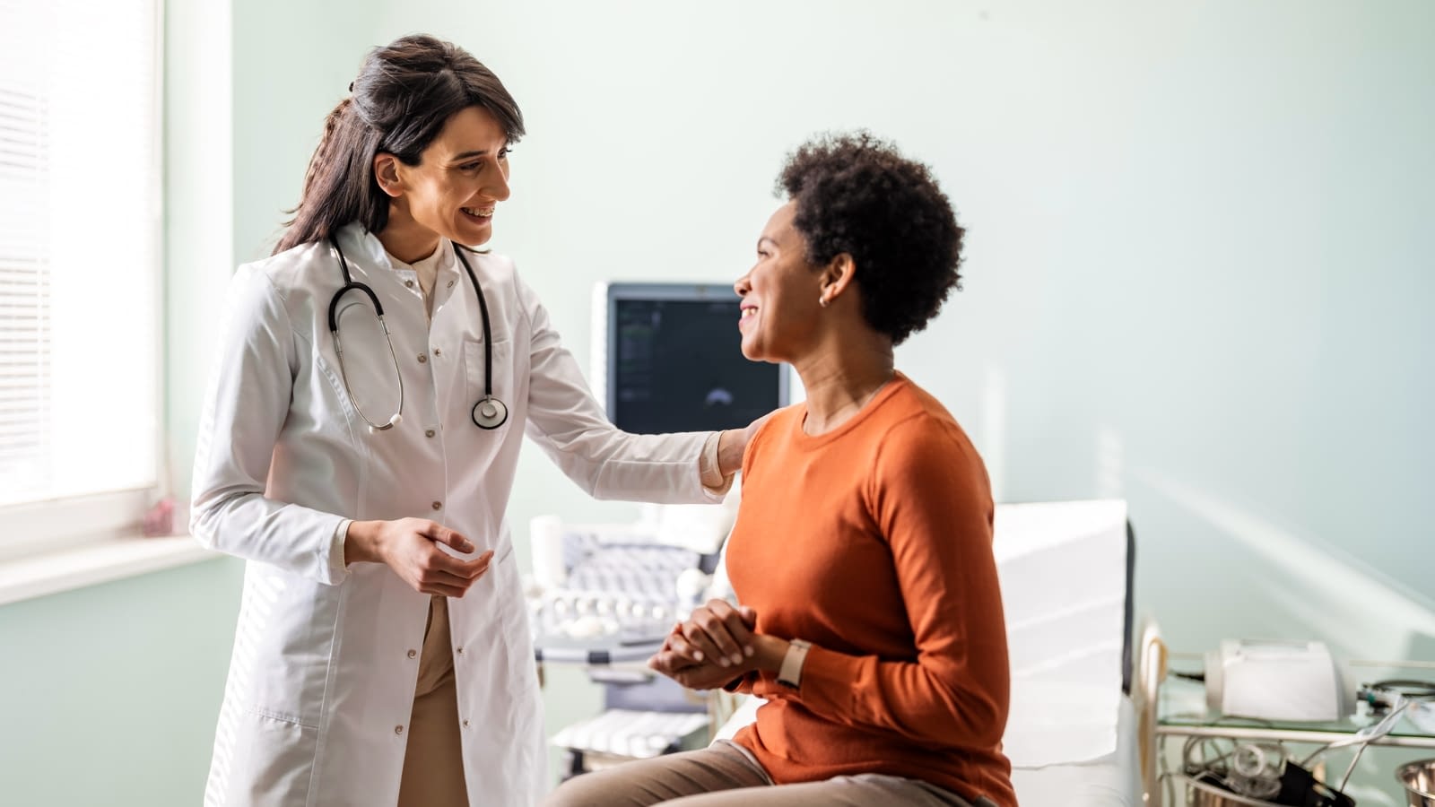 Woman speaking with her doctor