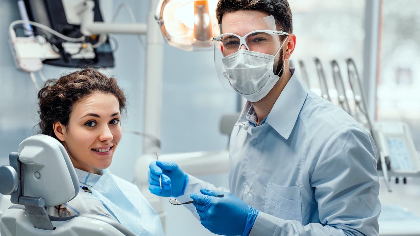 Dentist-Patient-Teeth-Cleaning.jpg