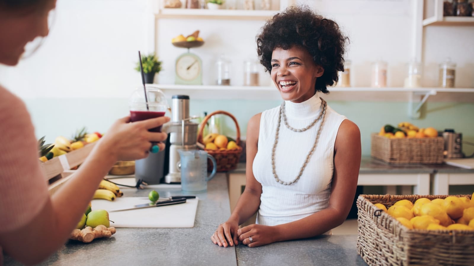 Woman smiling at customer