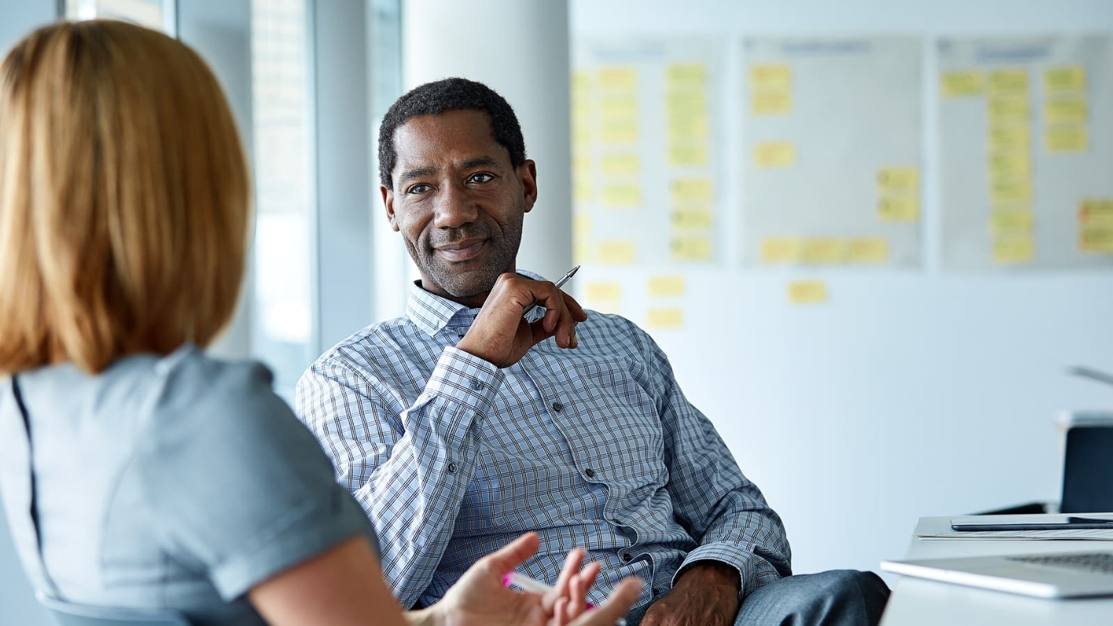 buy:sell protection businessman discussing insurance options