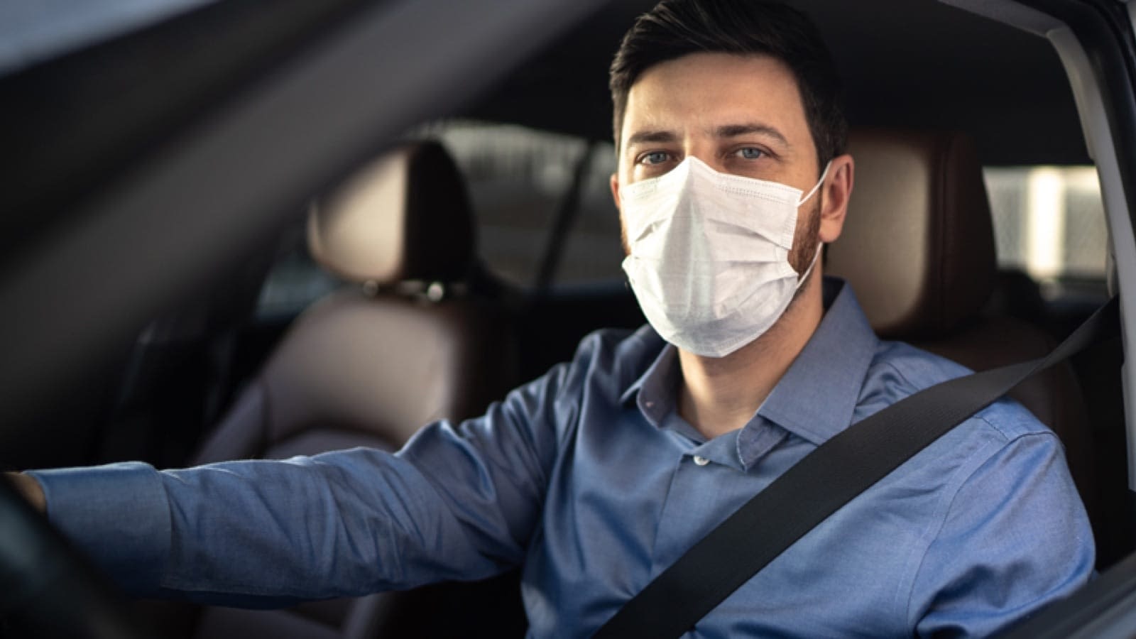 covid-large Man wearing a medical facemask