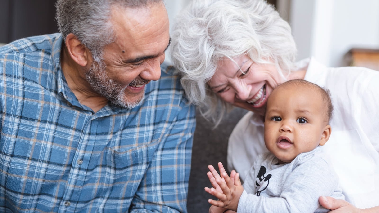 July 22 blog Grandparents spending time with new grandbaby.