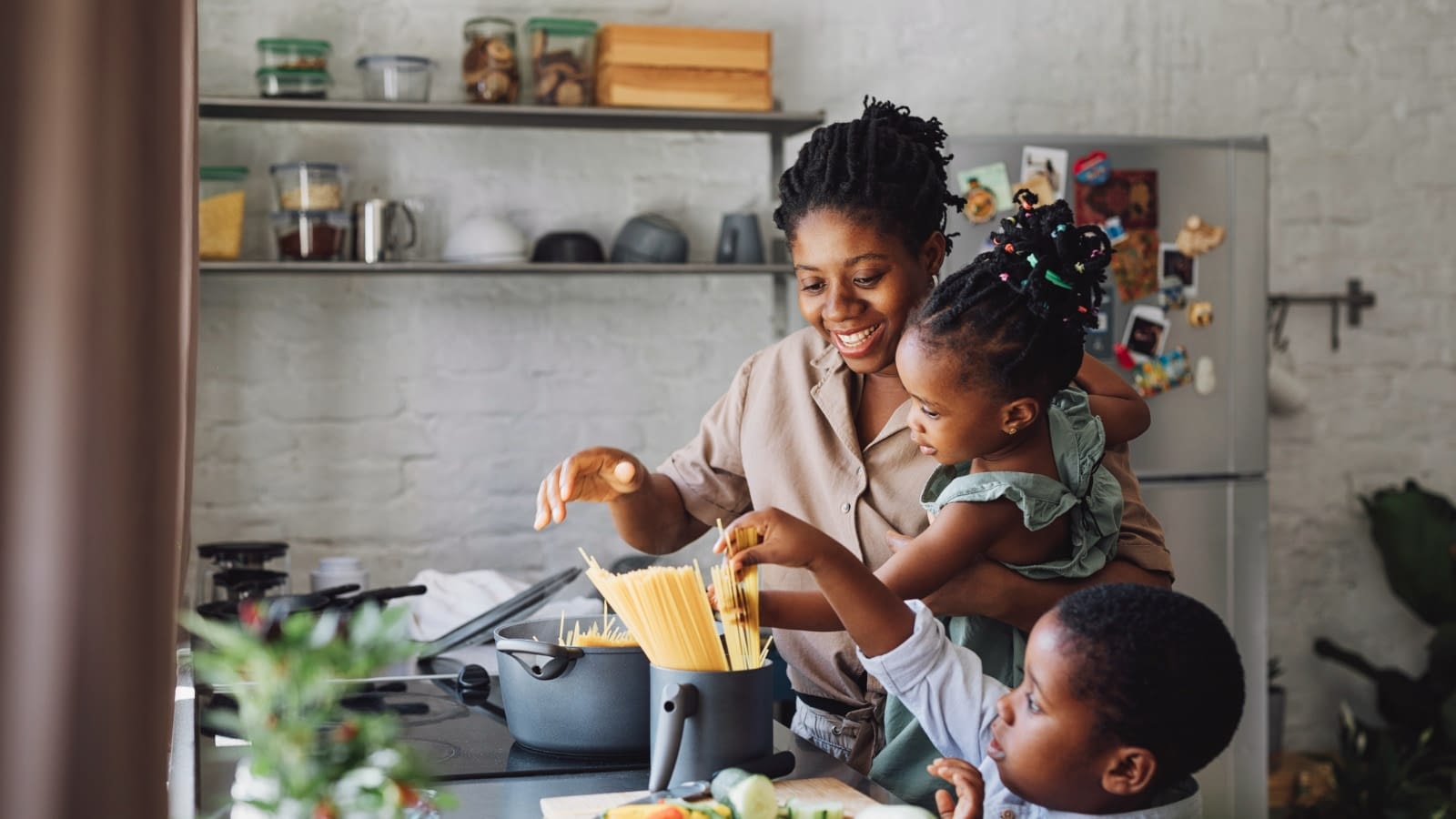 September 7 blog Two children helping their mom cook