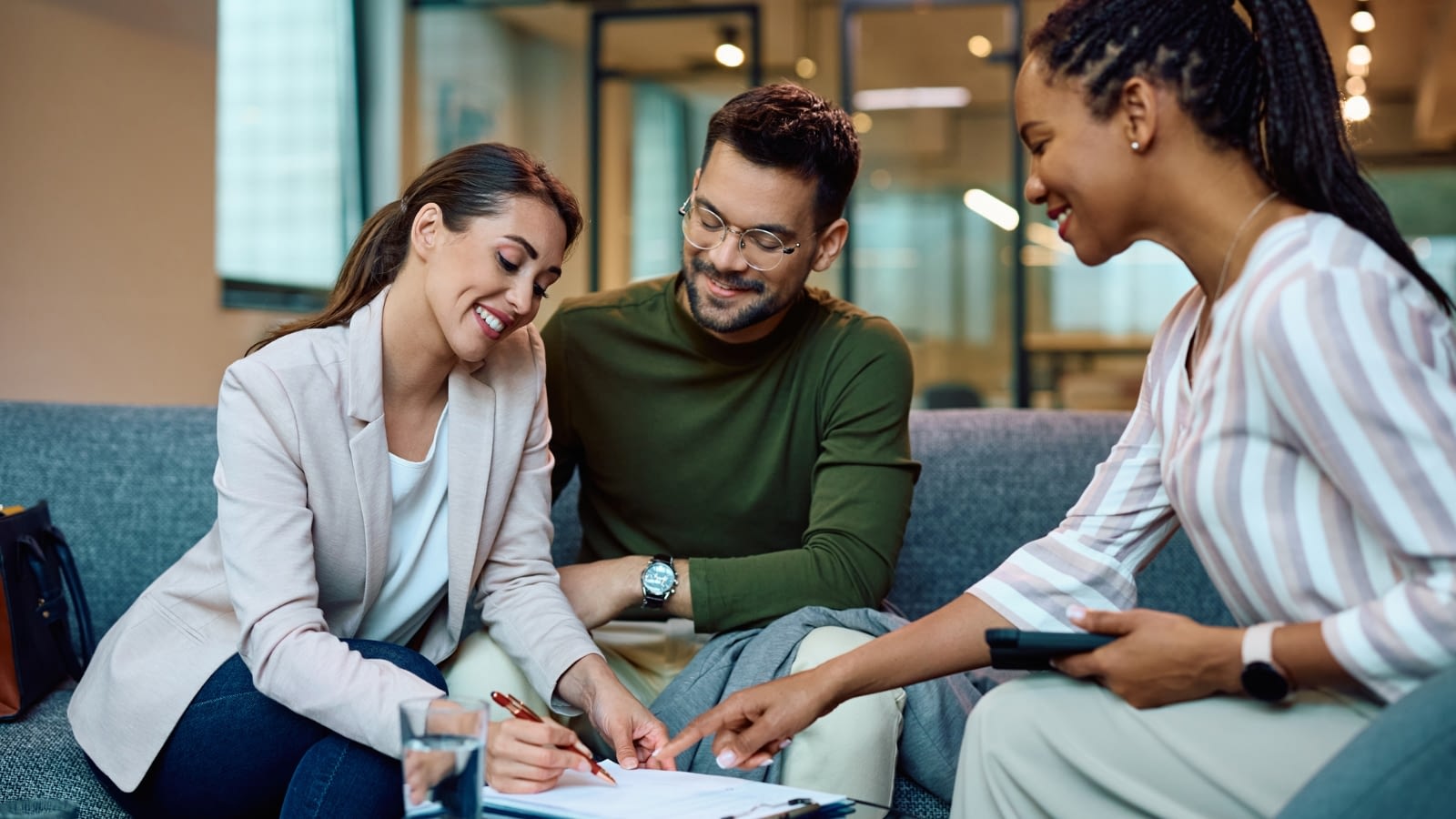 couple working with insurance agent