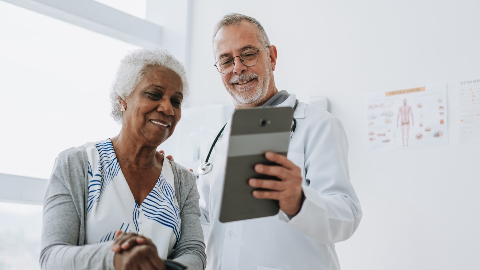 Senior African-American woman speaking with her doctor