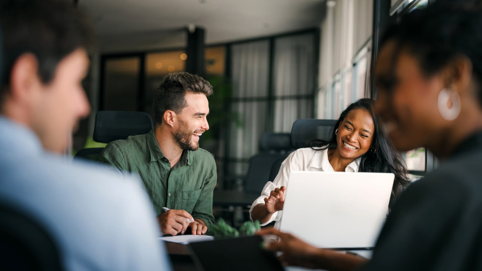 7 Group of young multi-ethnic business team collaborating