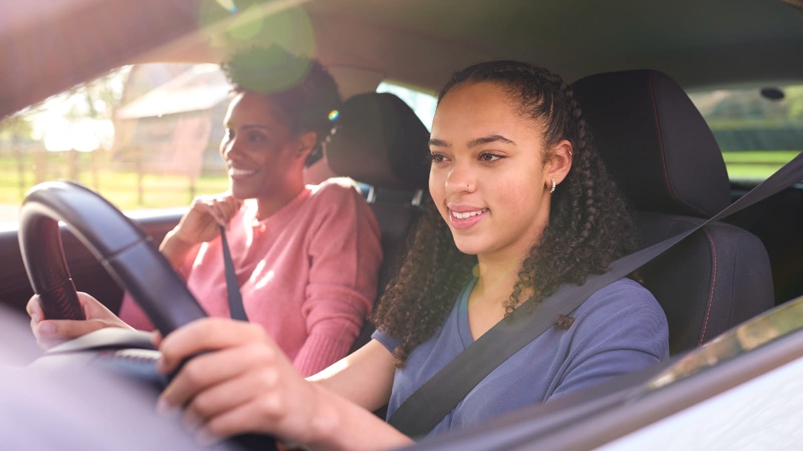 August 1 Teen female driver in car
