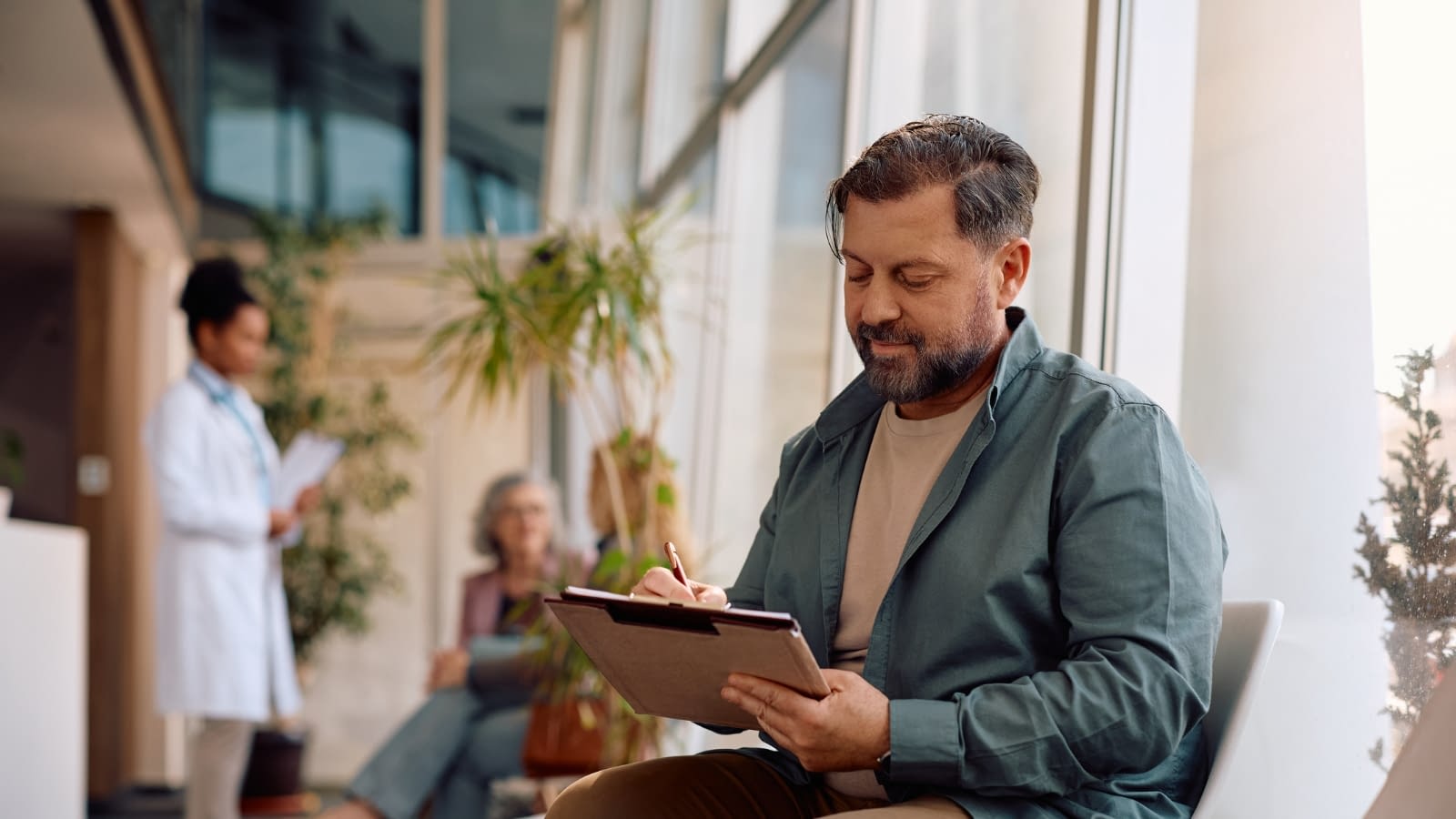 March 10 blog Man reading clipboard