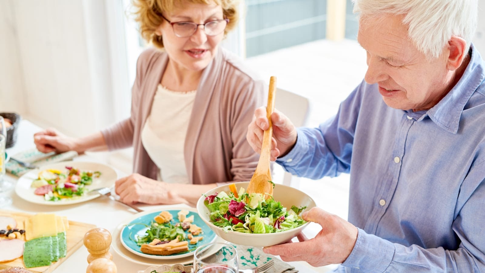 Couple at Thanksgiving Couple eating healthy Thanksgiving meal