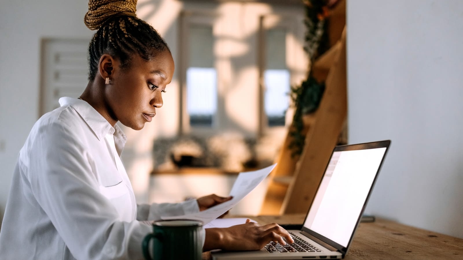 final expense insurance woman researching insurance on computer