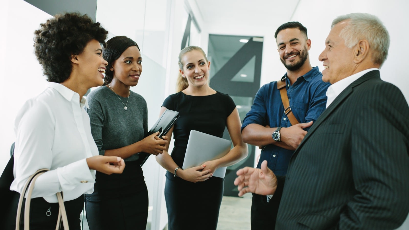 Group of employees laughing