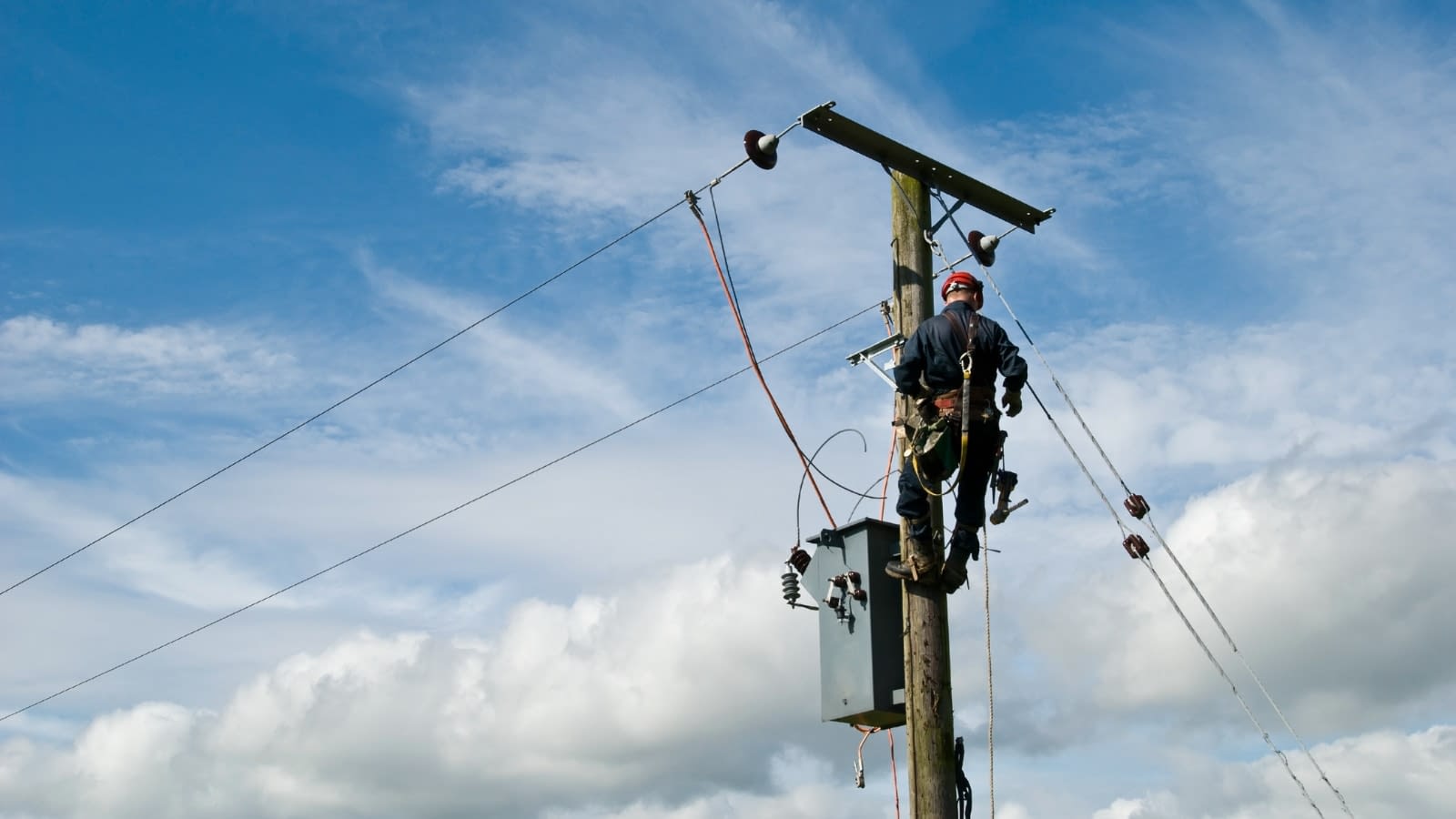 Dec 7 blog electrician fixing phone pole wire