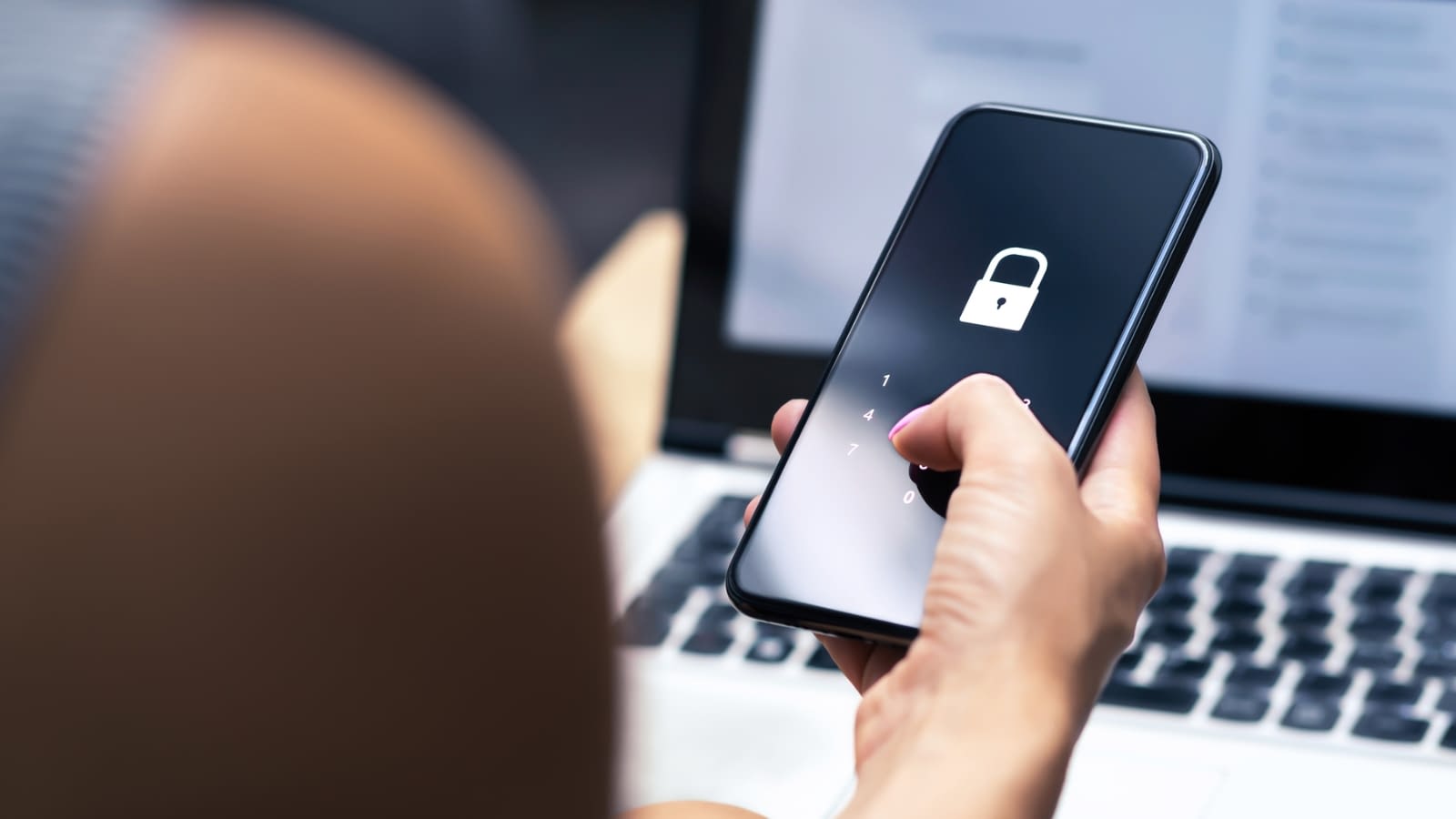 prevent identity theft person entering passcode on phone