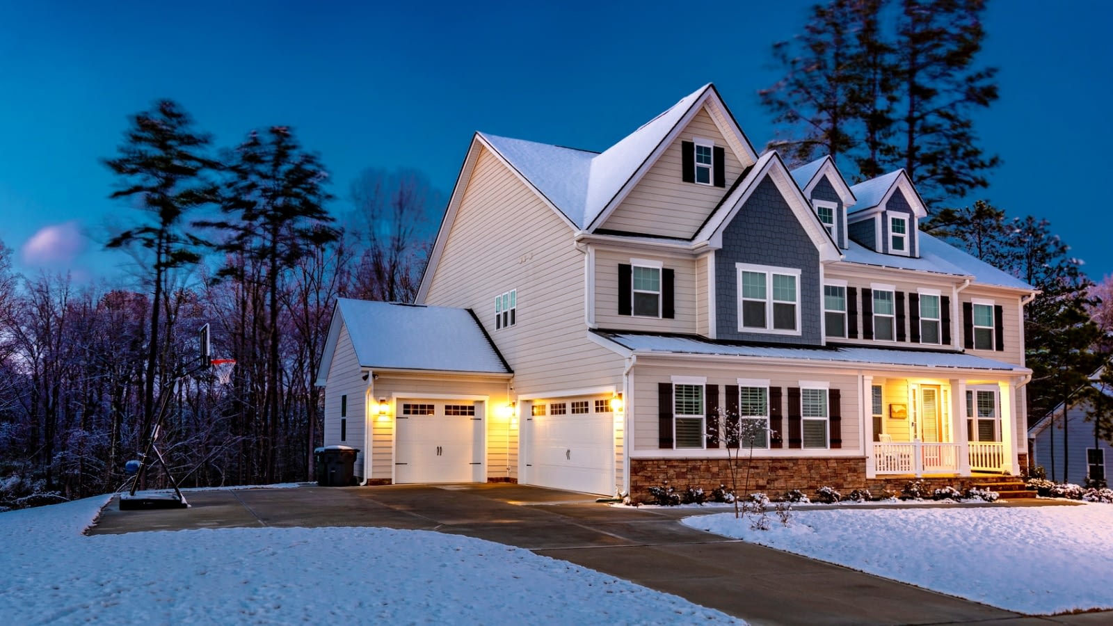 snow-capped house in winter