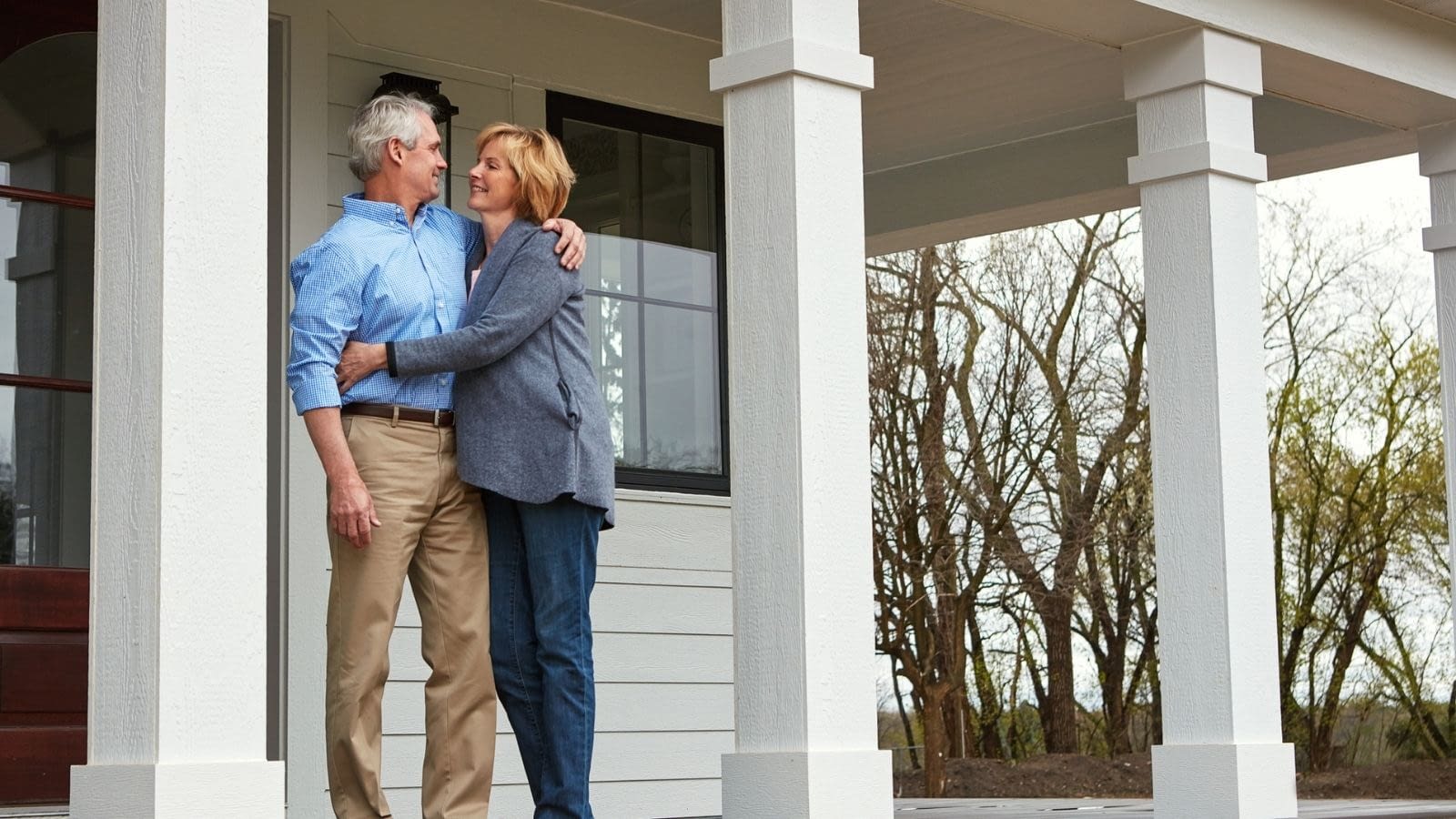 Client Blog August 2025 Older couple embracing on front porch