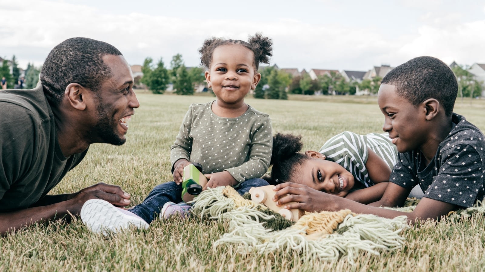 man with three children