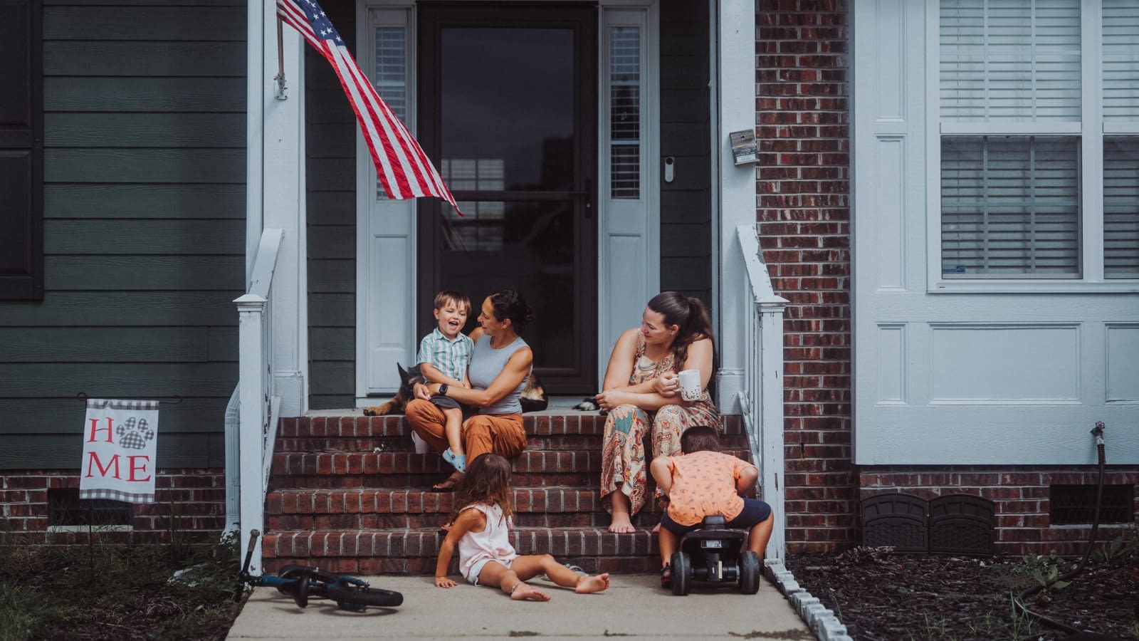 June 2 blog family sitting on porch