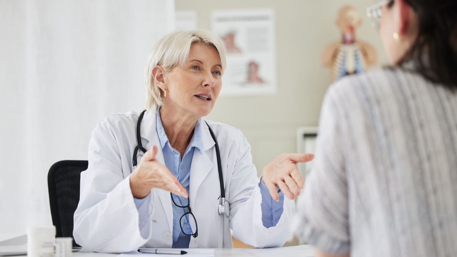 Doctor speaking to patient