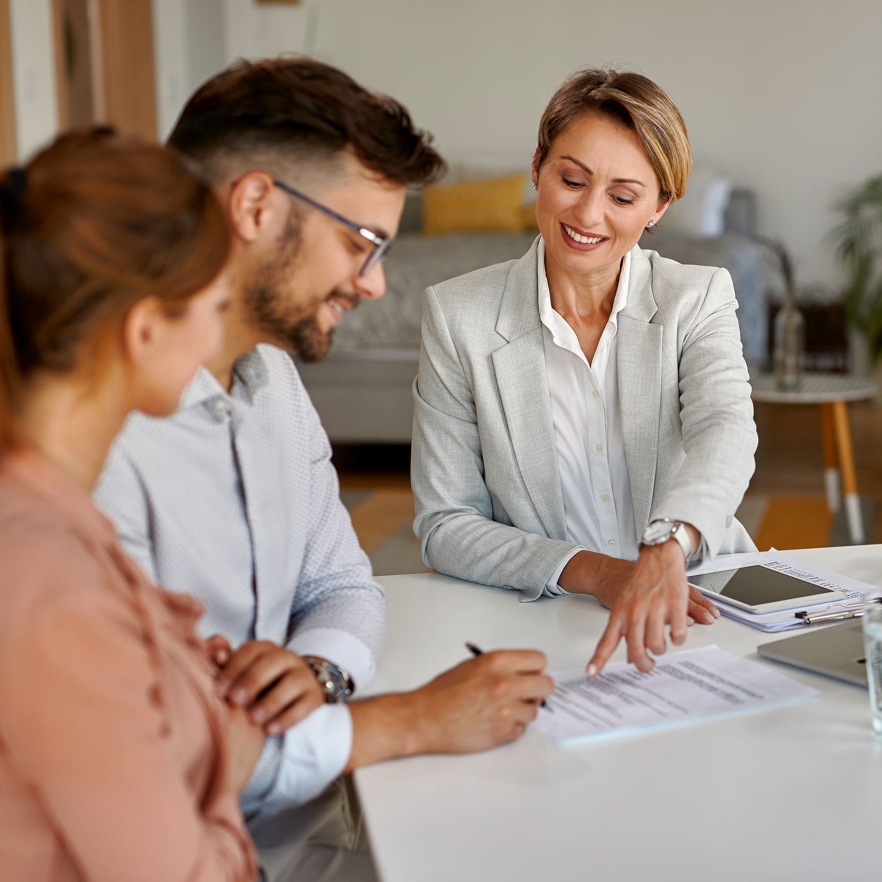 people reviewing papers during a meeting