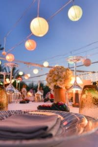 Close up of place setting for an outdoor wedding.