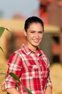 Female Farmer Standing on Her Farm