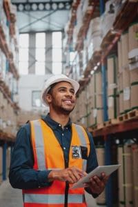 Warehouse worker checking inventory.