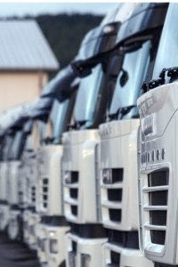 Several Commercial Trucks in a Line