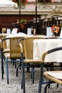 Empty Restaurant Chairs and Tables Set Up Outside