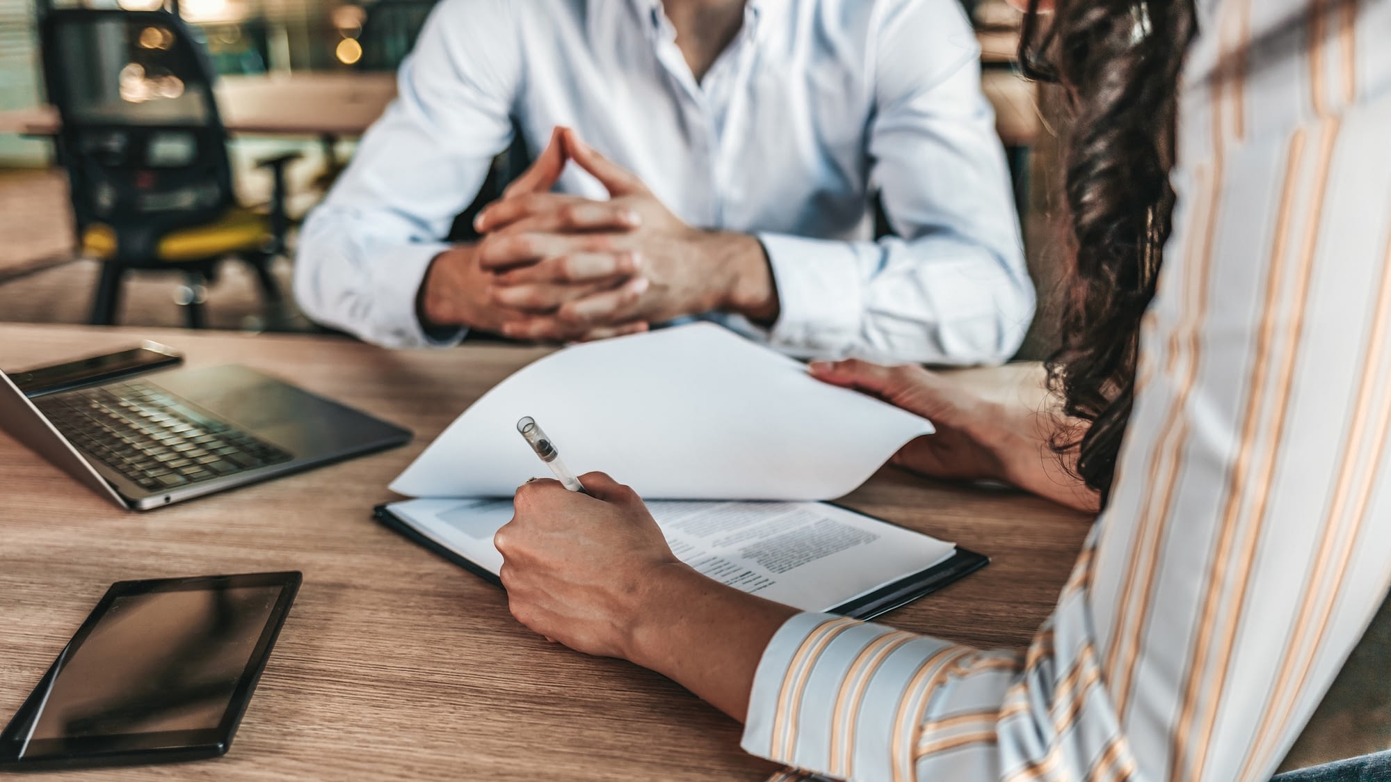 man and woman going over paperwork