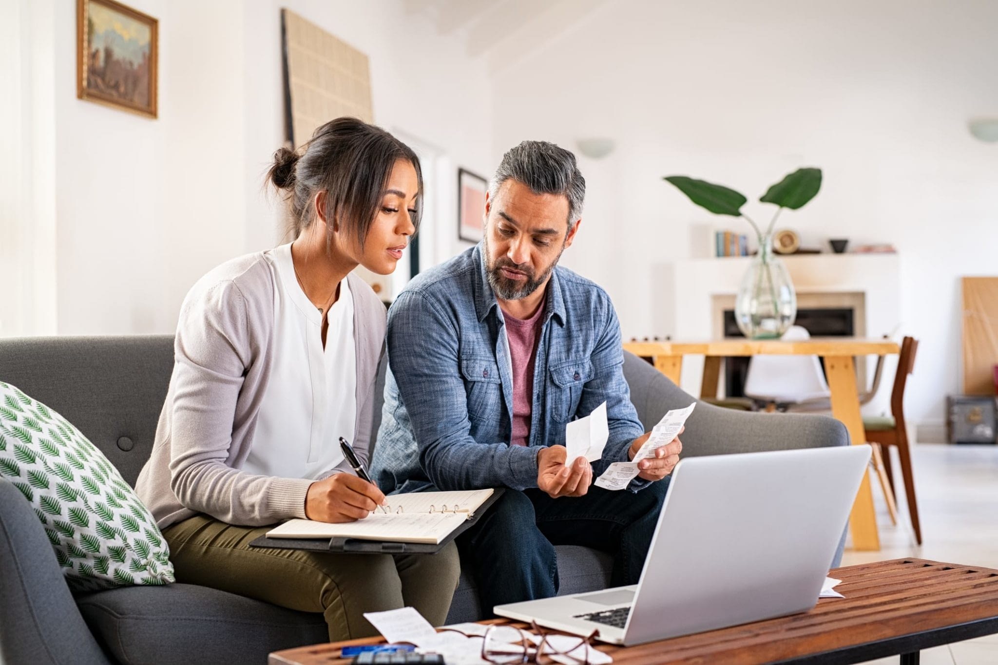 Latino Couple Reviewing Paperwork