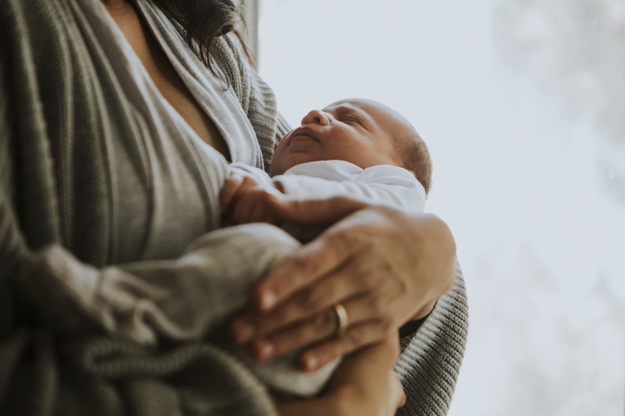 New Mother Holding Newborn Baby