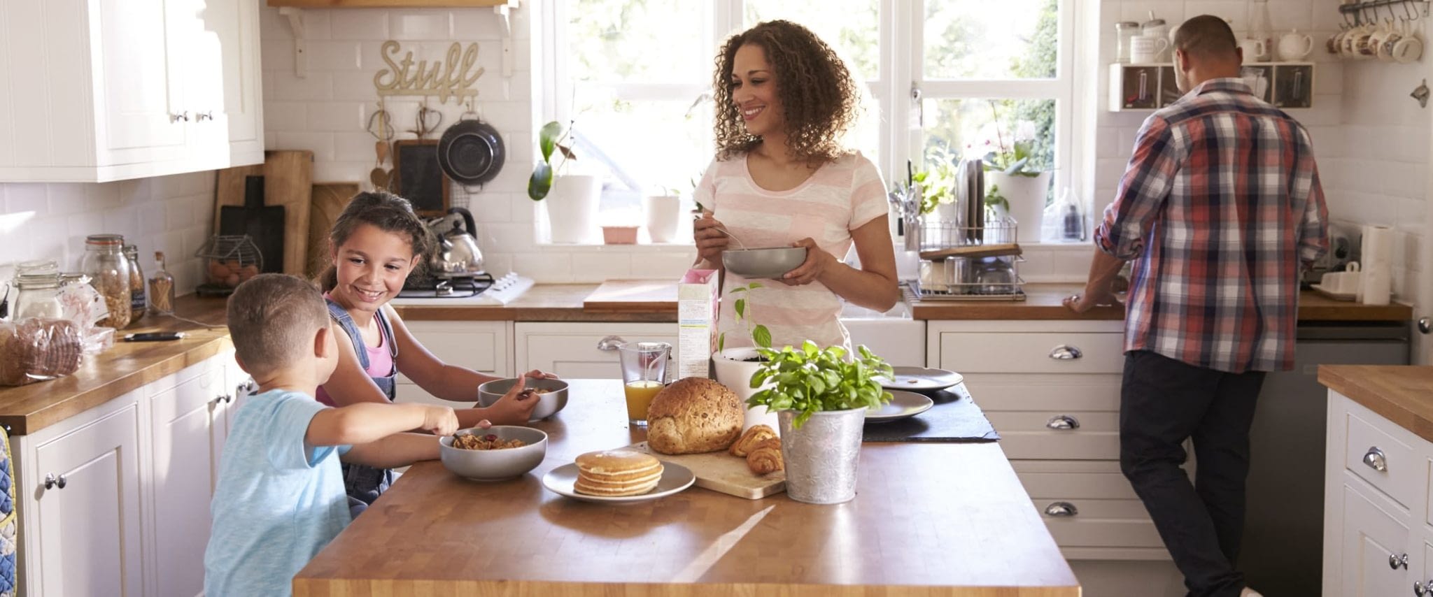 Happy Family Cooking in the Kitchen