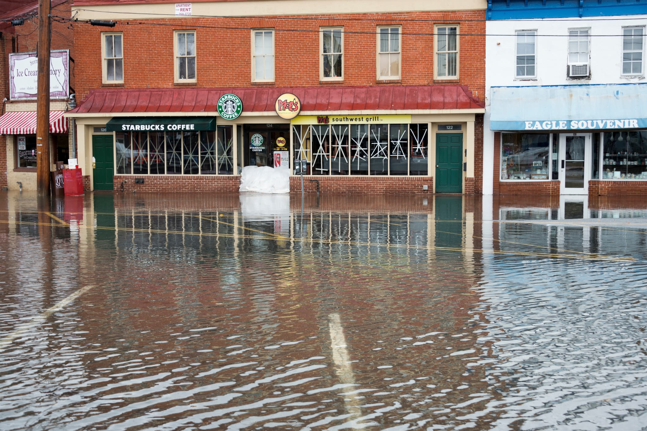 Hurricane Sandy Flood Closes Businesses at Annapolis Harbor Flooded streets in front of business storefronts