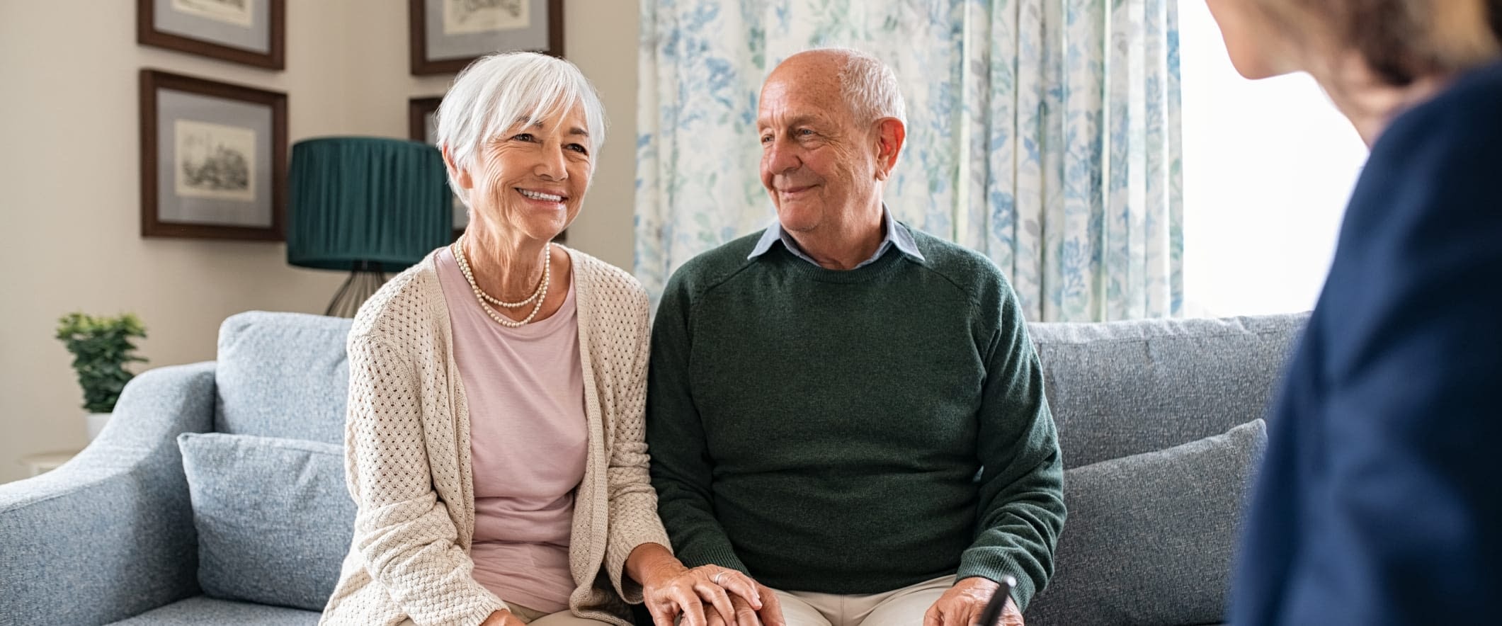 Common Medicare Questions to Ask Happy Senior Couple With Advisor