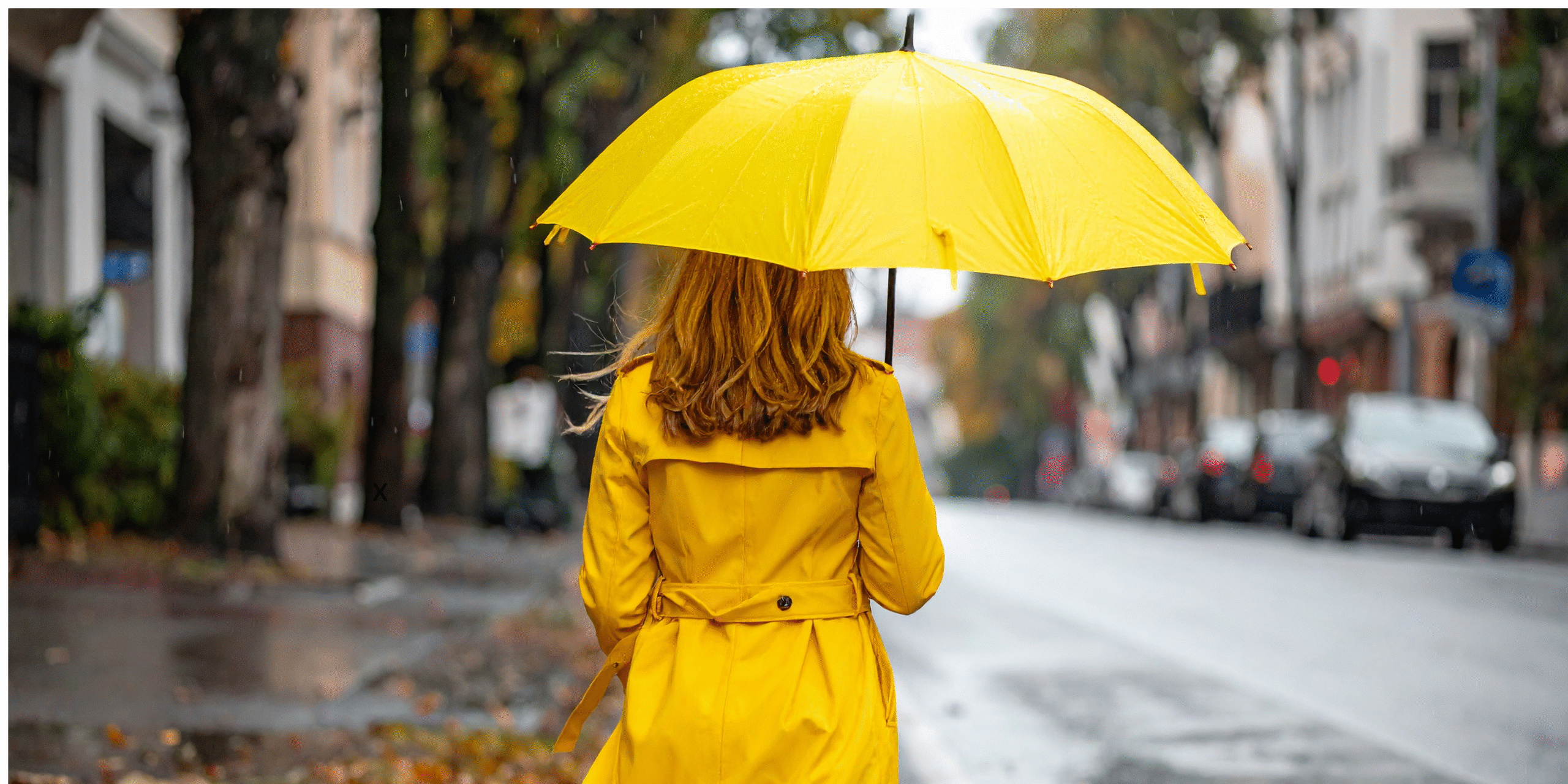 Woman with yellow umbrella
