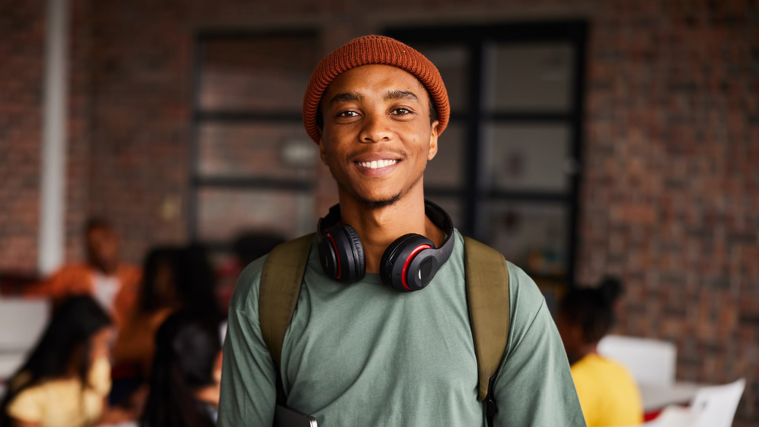 college student using headphones