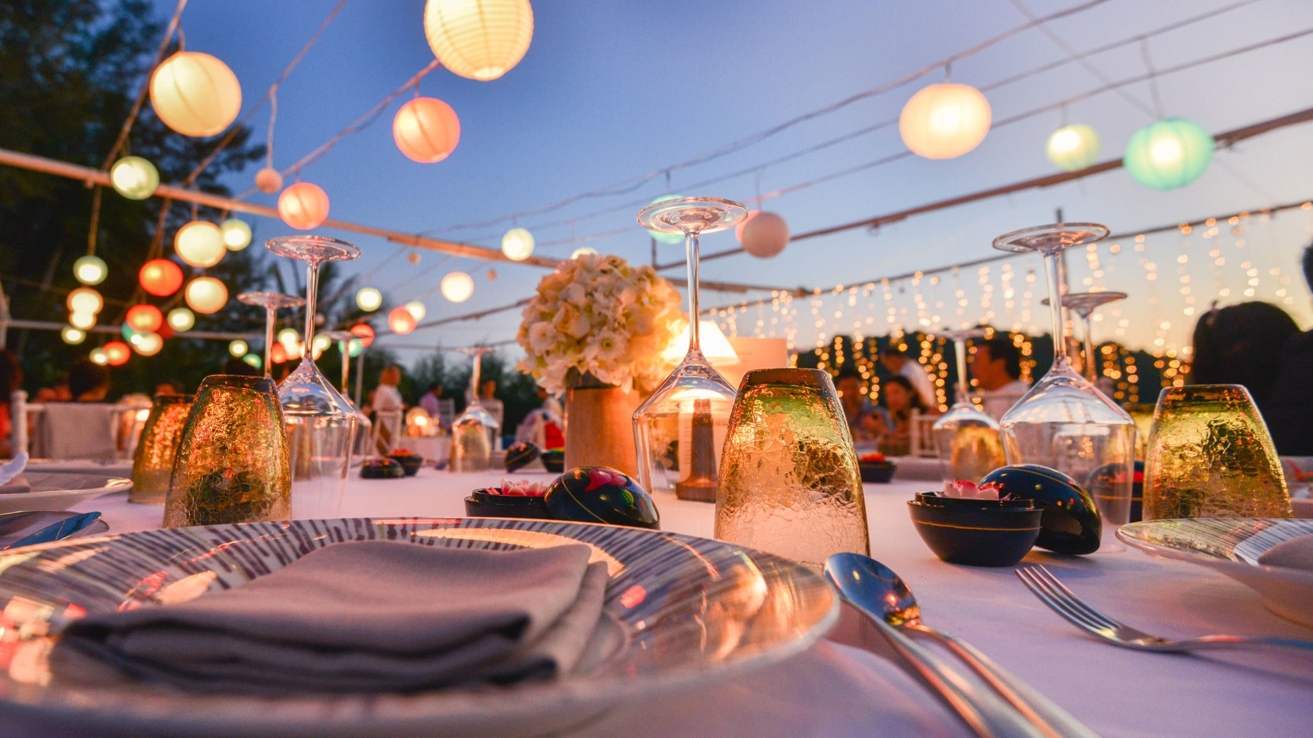 Close up of place setting for an outdoor wedding.