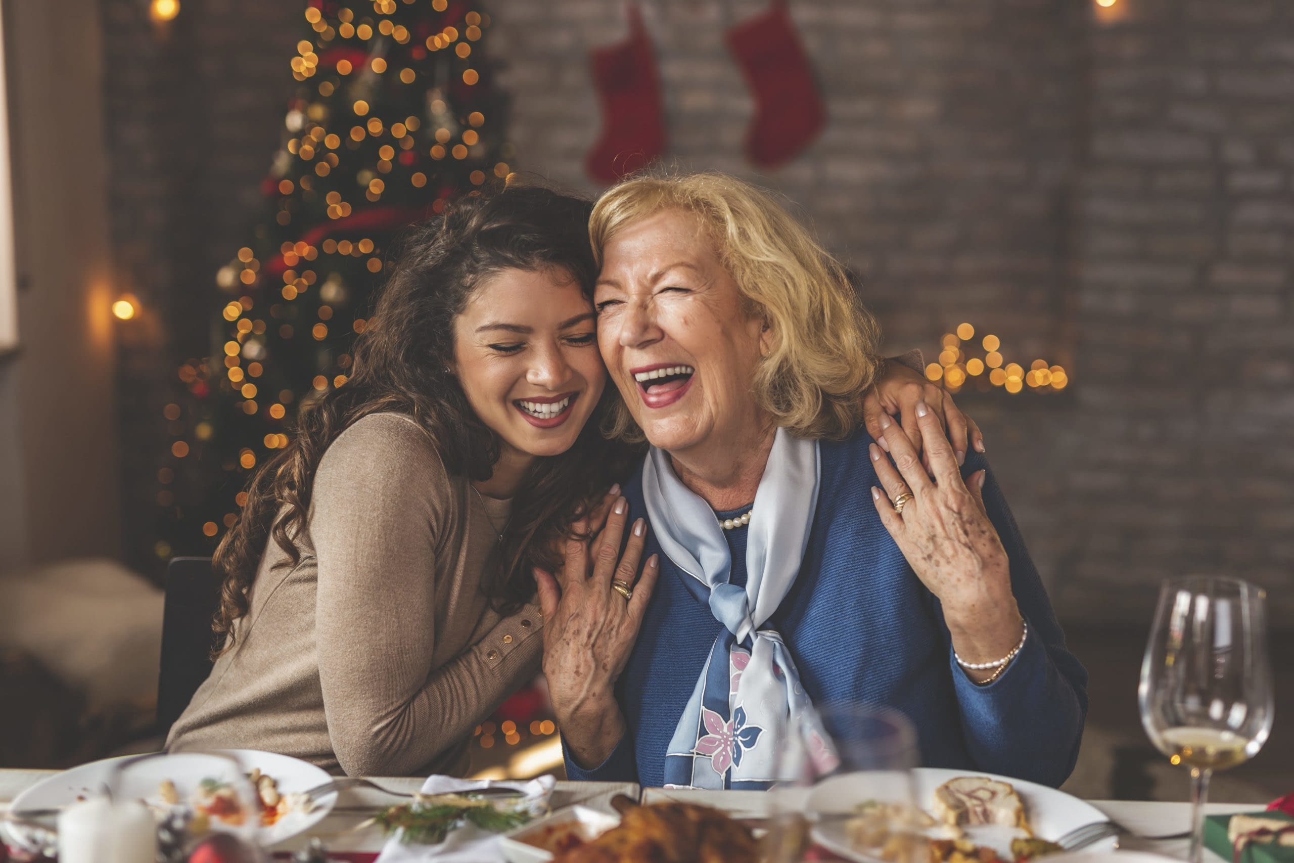 GettyImages-1271295516 mother and daughter at dinner table
