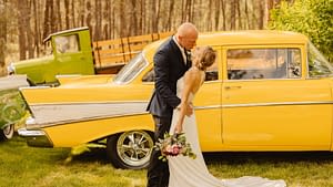 wedding photo in front of classic car